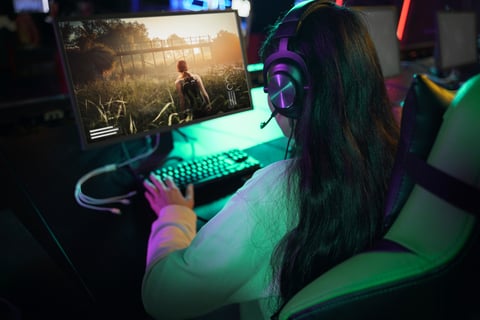 high-angle-woman-playing-videogame-on-computer